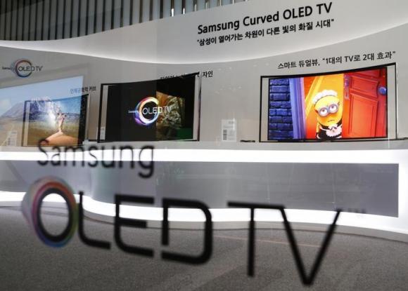 Samsung Electronics' first curved, super-thin OLED television sets are displayed at the main office of the company in Seoul